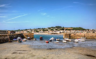 Looking out from Marazion harbour. Boats in the foreground